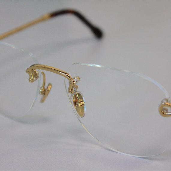 Montage de  verres percés sur lunettes FRED.